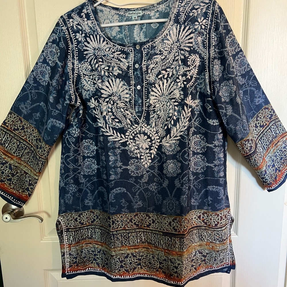 Beautiful, very light weight fabric, nearly 30% silk women top. Never worn.